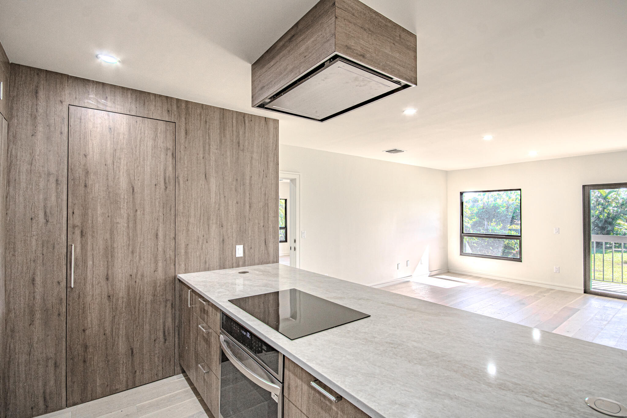 13334 Polo Club Road, Unit 348 Wellington, FL 33414 - Photo 11 of 43 a kitchen with a sink and large window