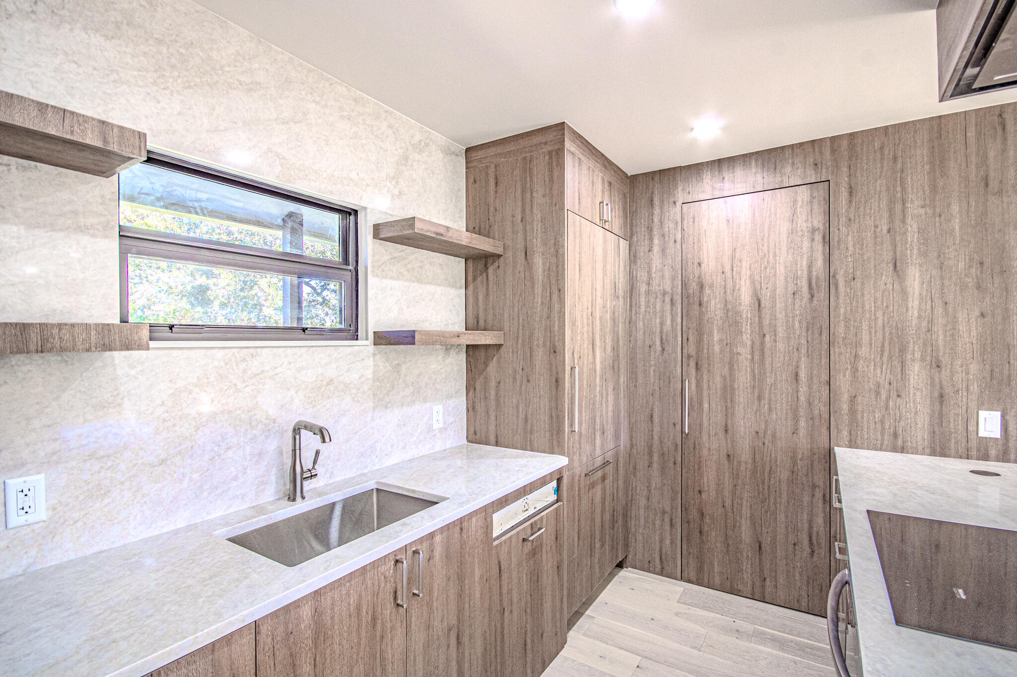 13334 Polo Club Road, Unit 348 Wellington, FL 33414 - Photo 13 of 43 a bathroom with a sink and a large mirror