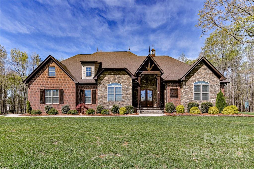 9625 Kerr Road Indian Trail, NC 28079 - Photo 1 of 48 a front view of a house with garden