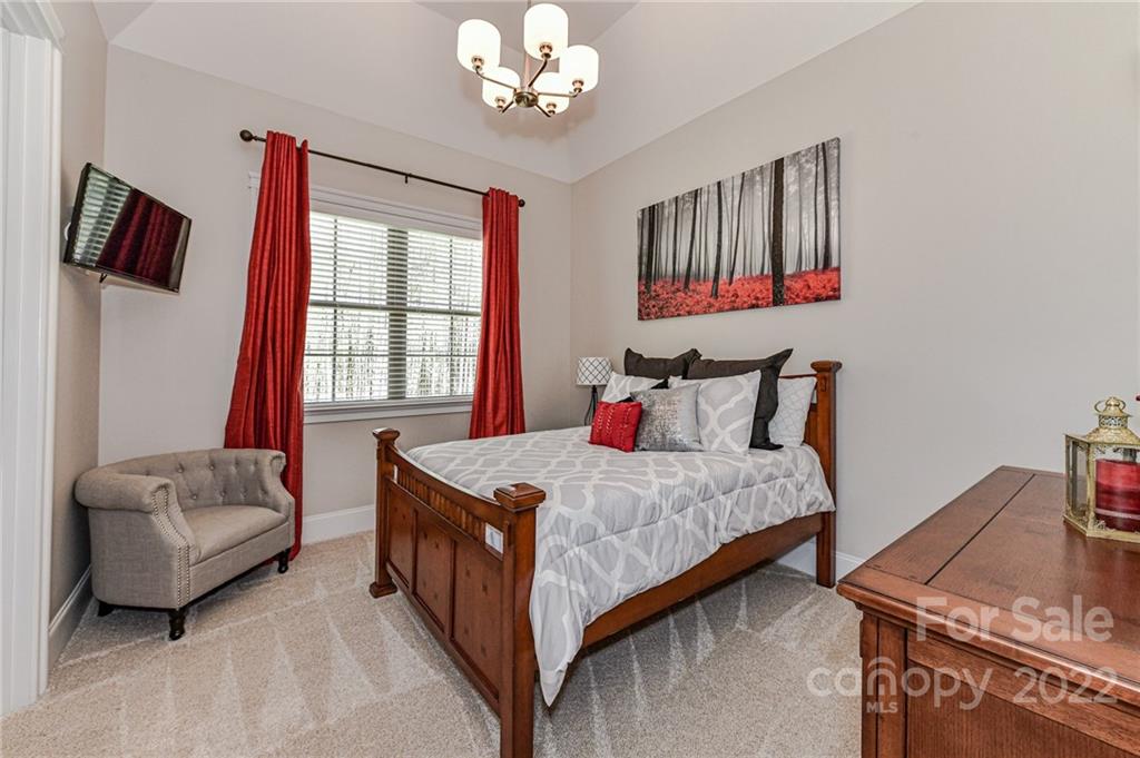 9625 Kerr Road Indian Trail, NC 28079 - Photo 28 of 48 a bedroom with a bed window and couch