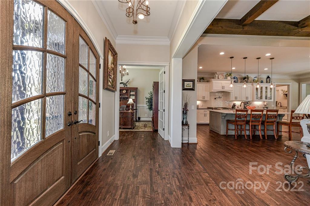 9625 Kerr Road Indian Trail, NC 28079 - Photo 3 of 48 a view of a dining room with furniture window and wooden floor