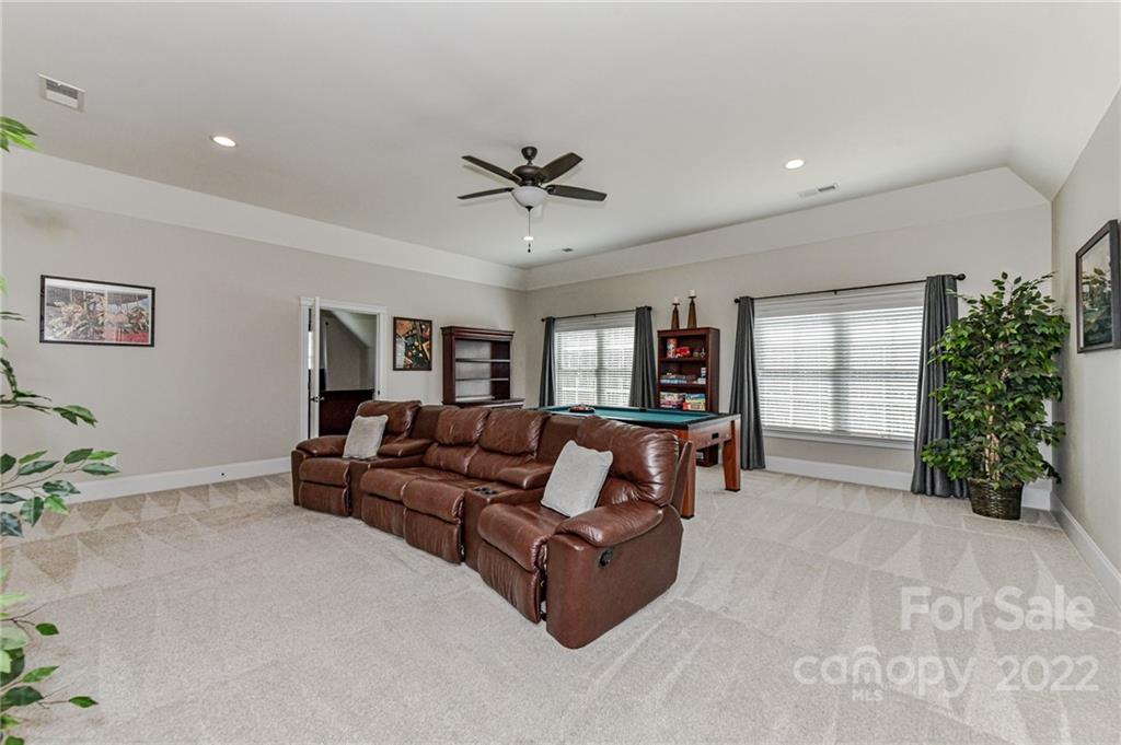 9625 Kerr Road Indian Trail, NC 28079 - Photo 33 of 48 a living room with furniture and a large window