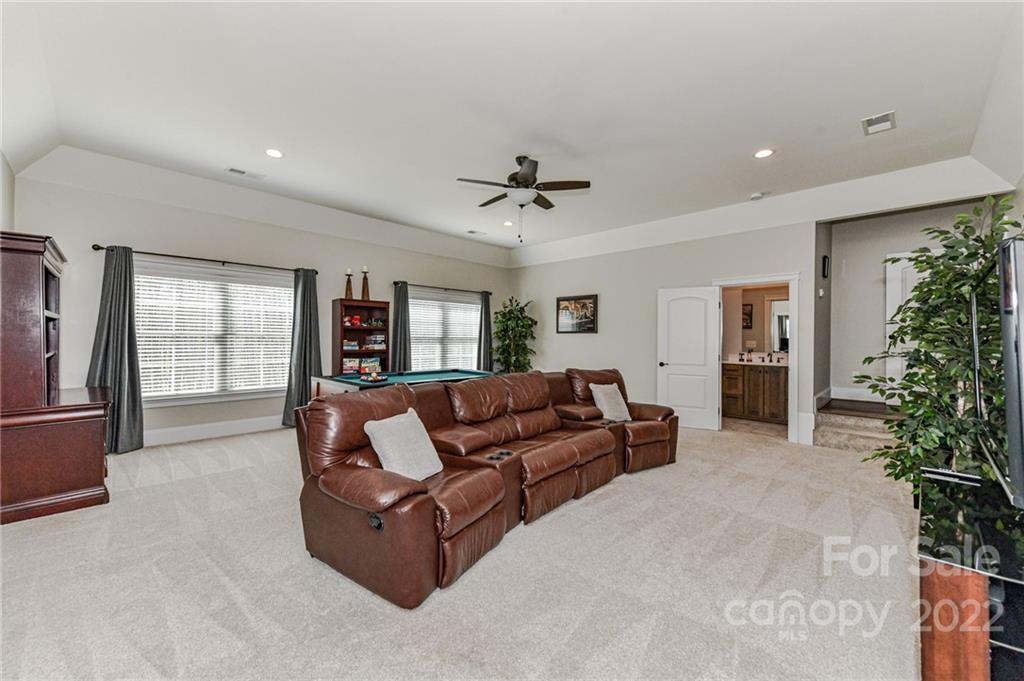 9625 Kerr Road Indian Trail, NC 28079 - Photo 34 of 48 a living room with furniture and a large window