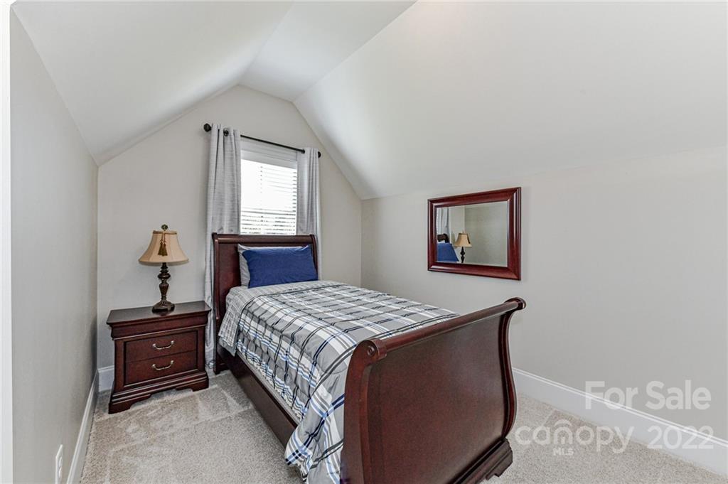 9625 Kerr Road Indian Trail, NC 28079 - Photo 36 of 48 a bedroom with a bed and a dresser