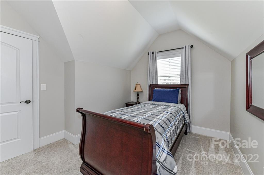 9625 Kerr Road Indian Trail, NC 28079 - Photo 37 of 48 a bedroom with a bed and a window