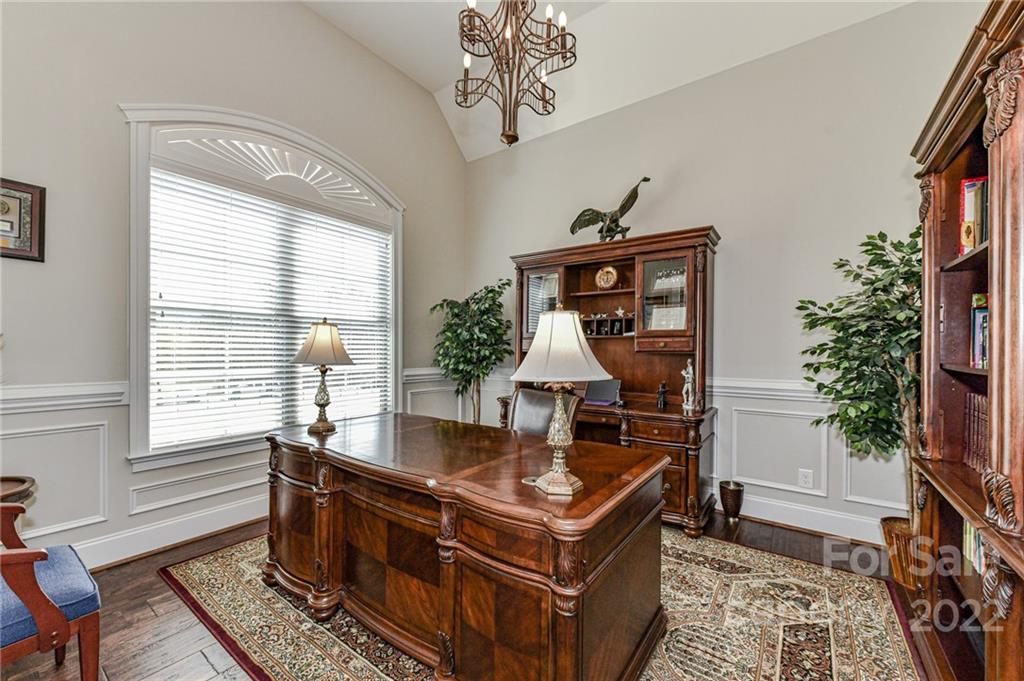 9625 Kerr Road Indian Trail, NC 28079 - Photo 4 of 48 a living room with furniture a potted plant and a window