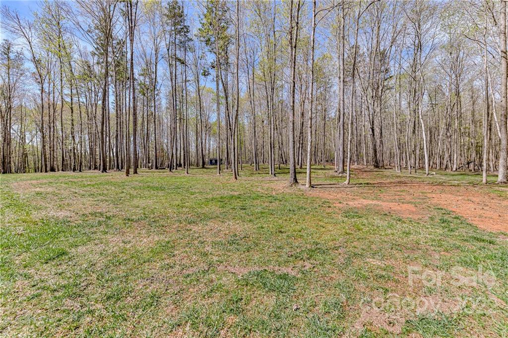 9625 Kerr Road Indian Trail, NC 28079 - Photo 45 of 48 a view of outdoor space with wooden fence