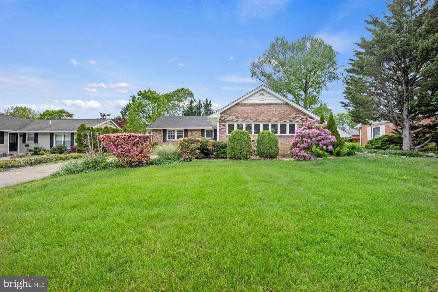 705 Halstead Road Wilmington, DE 19803 - Photo 1 of 31 a front view of a house with garden