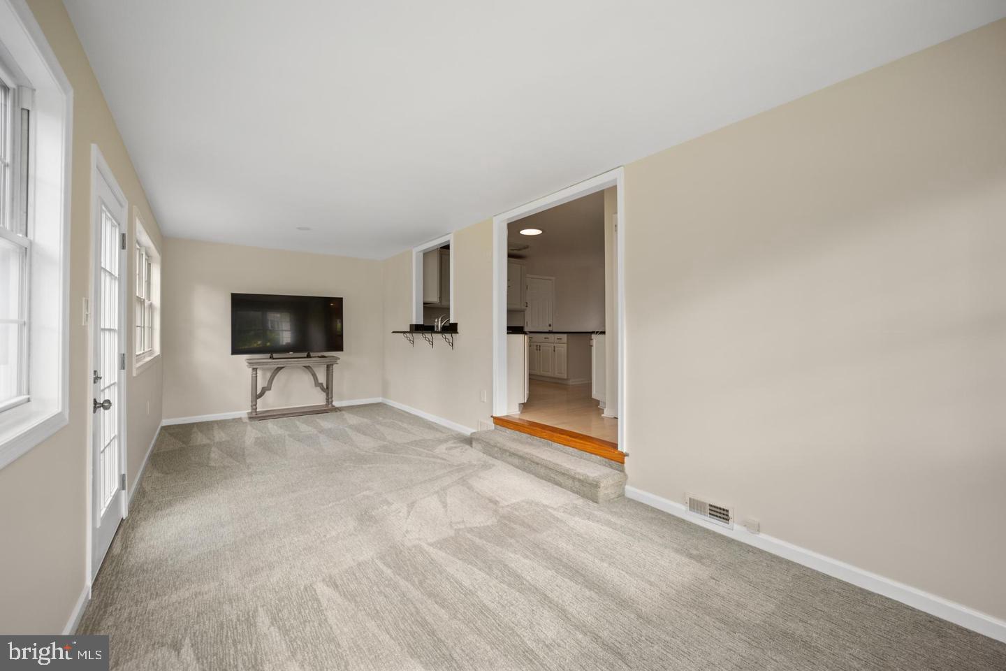 705 Halstead Road Wilmington, DE 19803 - Photo 13 of 31 wooden floor in an empty room with a window