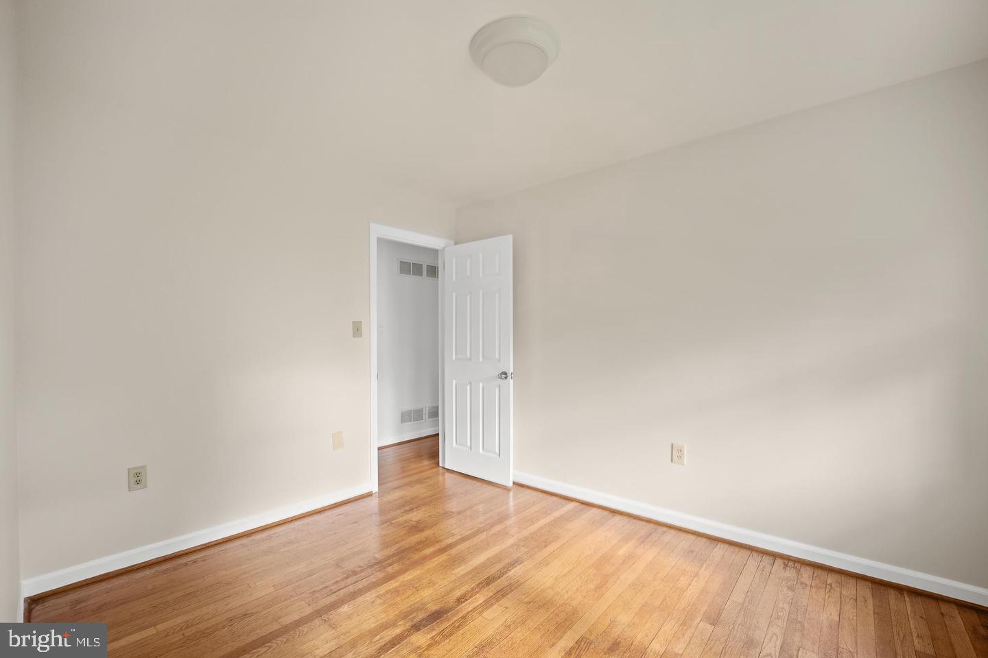 705 Halstead Road Wilmington, DE 19803 - Photo 23 of 31 a view of an empty room with wooden floor