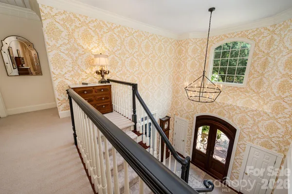 a view of staircase with large window