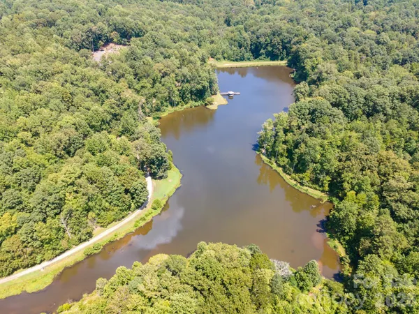 a view of a lake with a yard