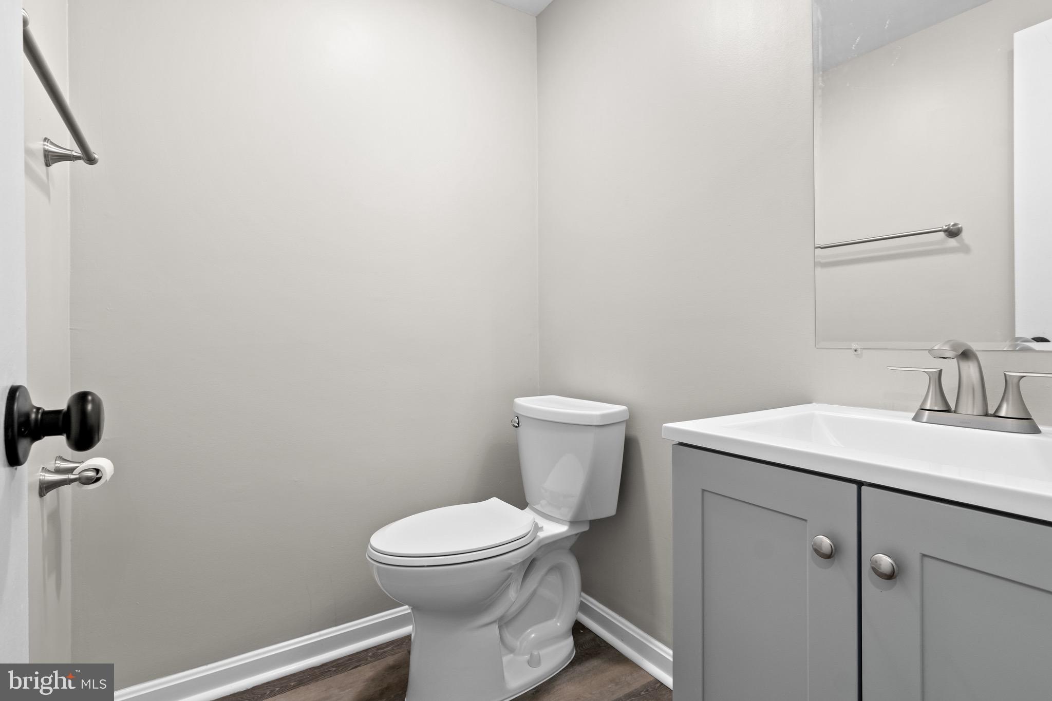 4727 Exeter Street Annandale, VA 22003 - Photo 11 of 35 a white toilet sitting next to a bathroom sink