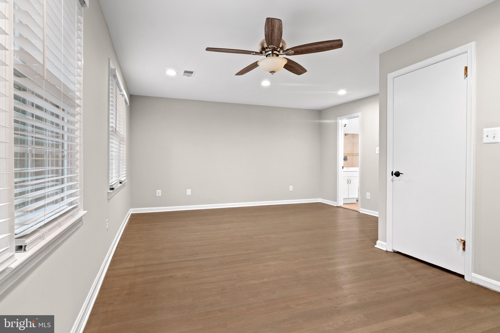 4727 Exeter Street Annandale, VA 22003 - Photo 13 of 35 a view of a livingroom with a ceiling fan and window
