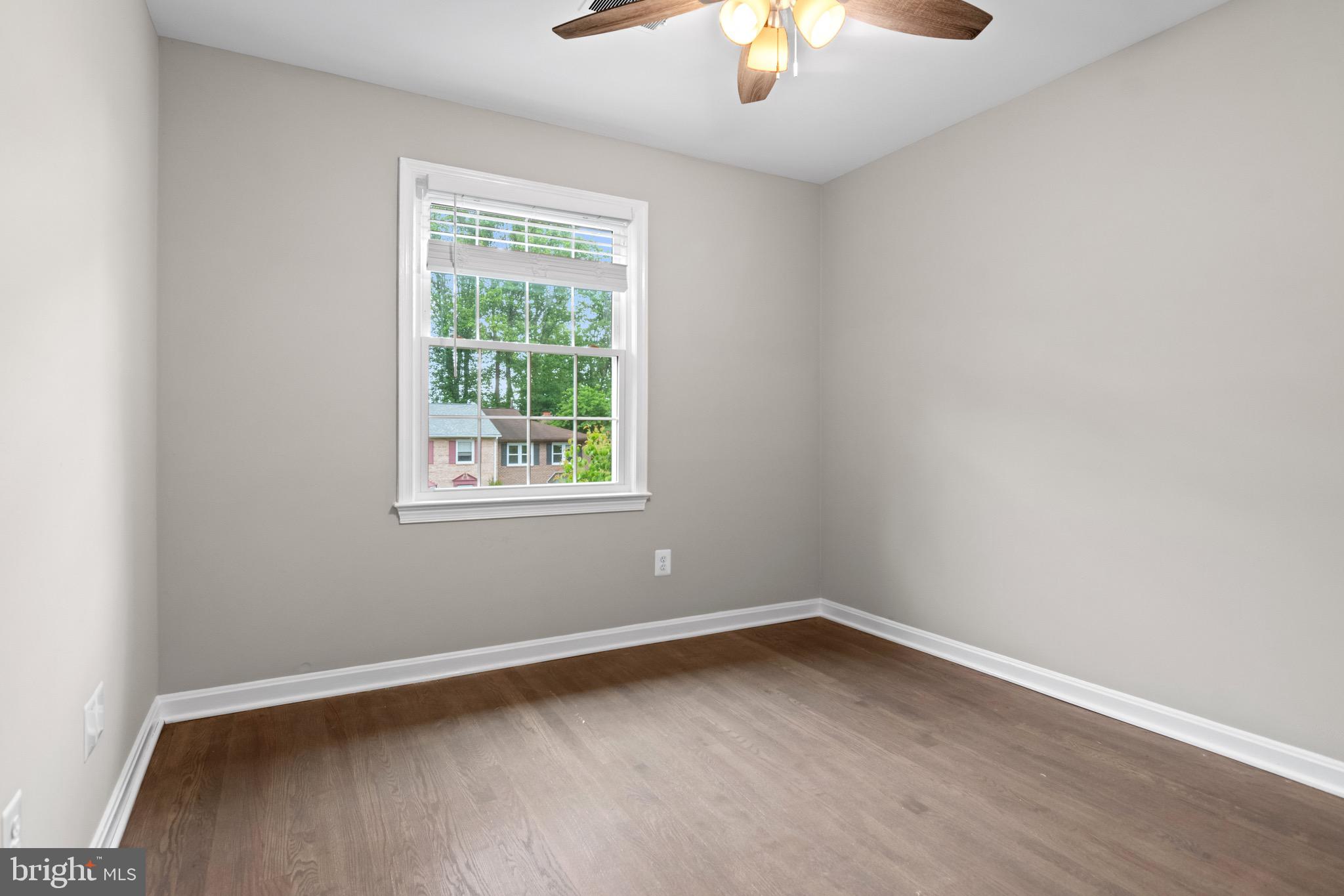 4727 Exeter Street Annandale, VA 22003 - Photo 17 of 35 wooden floor in an empty room with a window