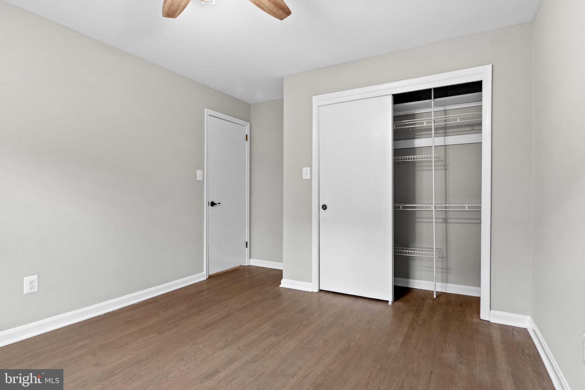 4727 Exeter Street Annandale, VA 22003 - Photo 20 of 35 a view of an empty room with wooden floor and closet