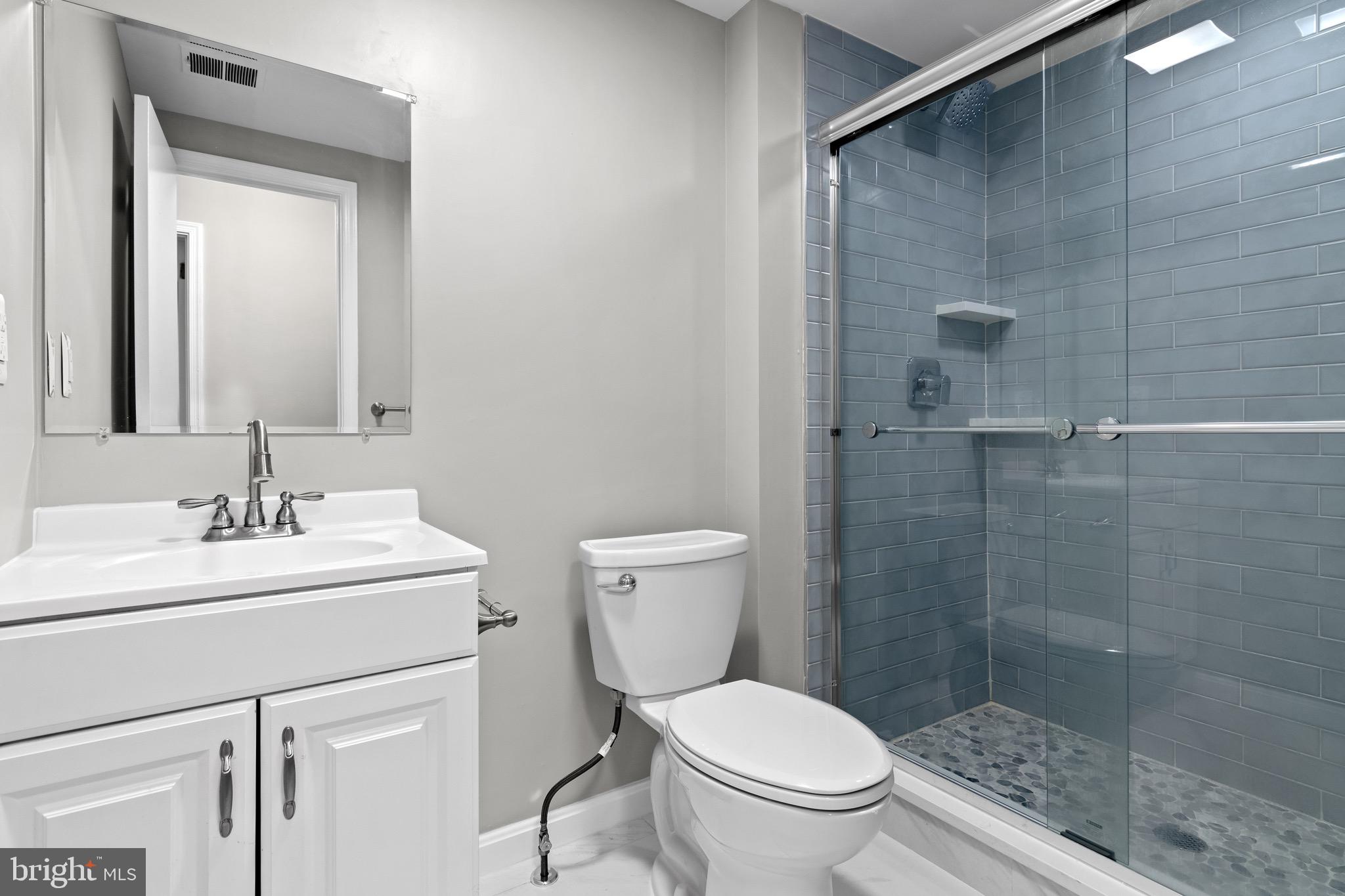4727 Exeter Street Annandale, VA 22003 - Photo 25 of 35 a bathroom with a sink toilet and shower