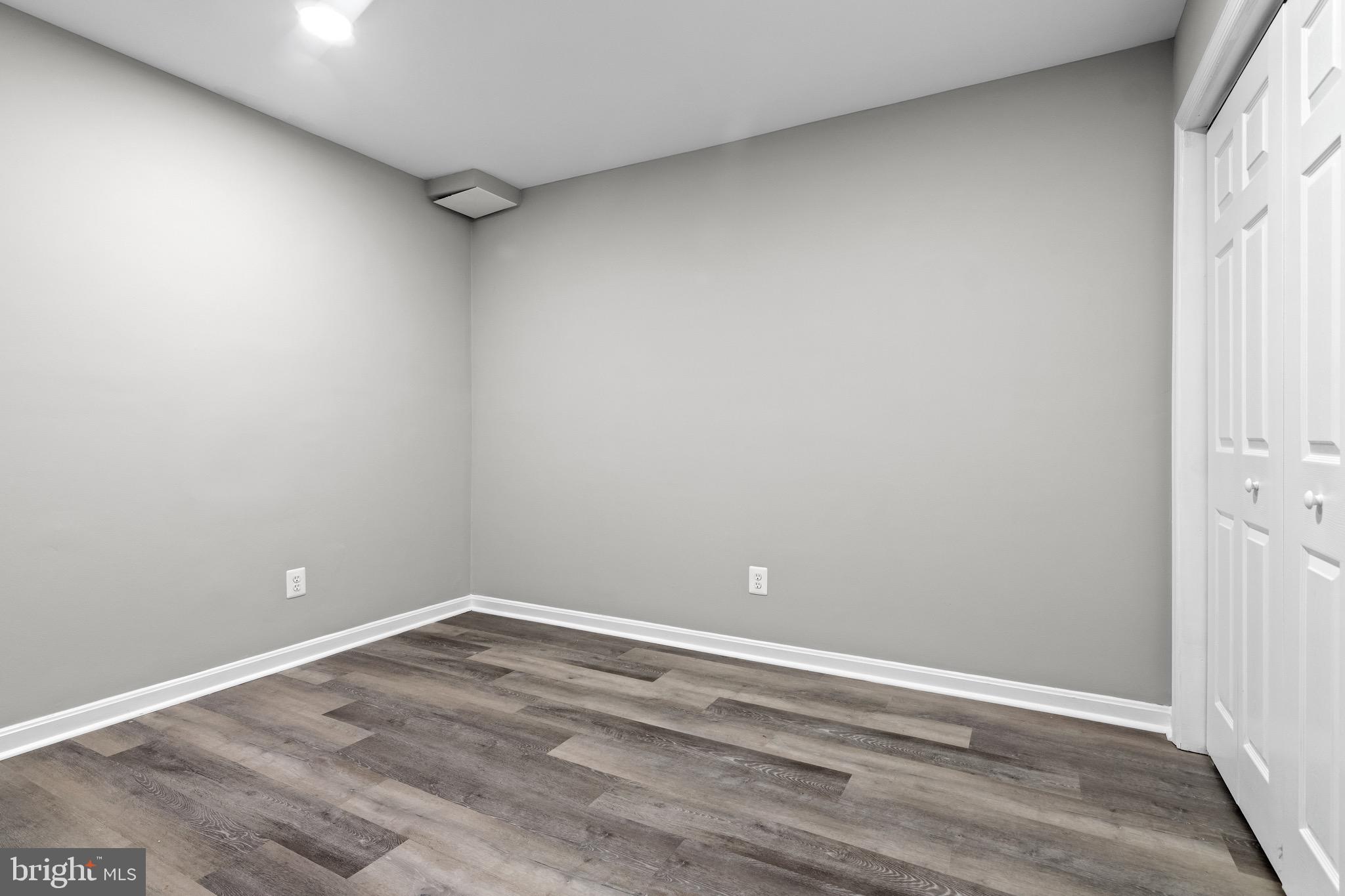 4727 Exeter Street Annandale, VA 22003 - Photo 26 of 35 a view of an empty room with wooden floor