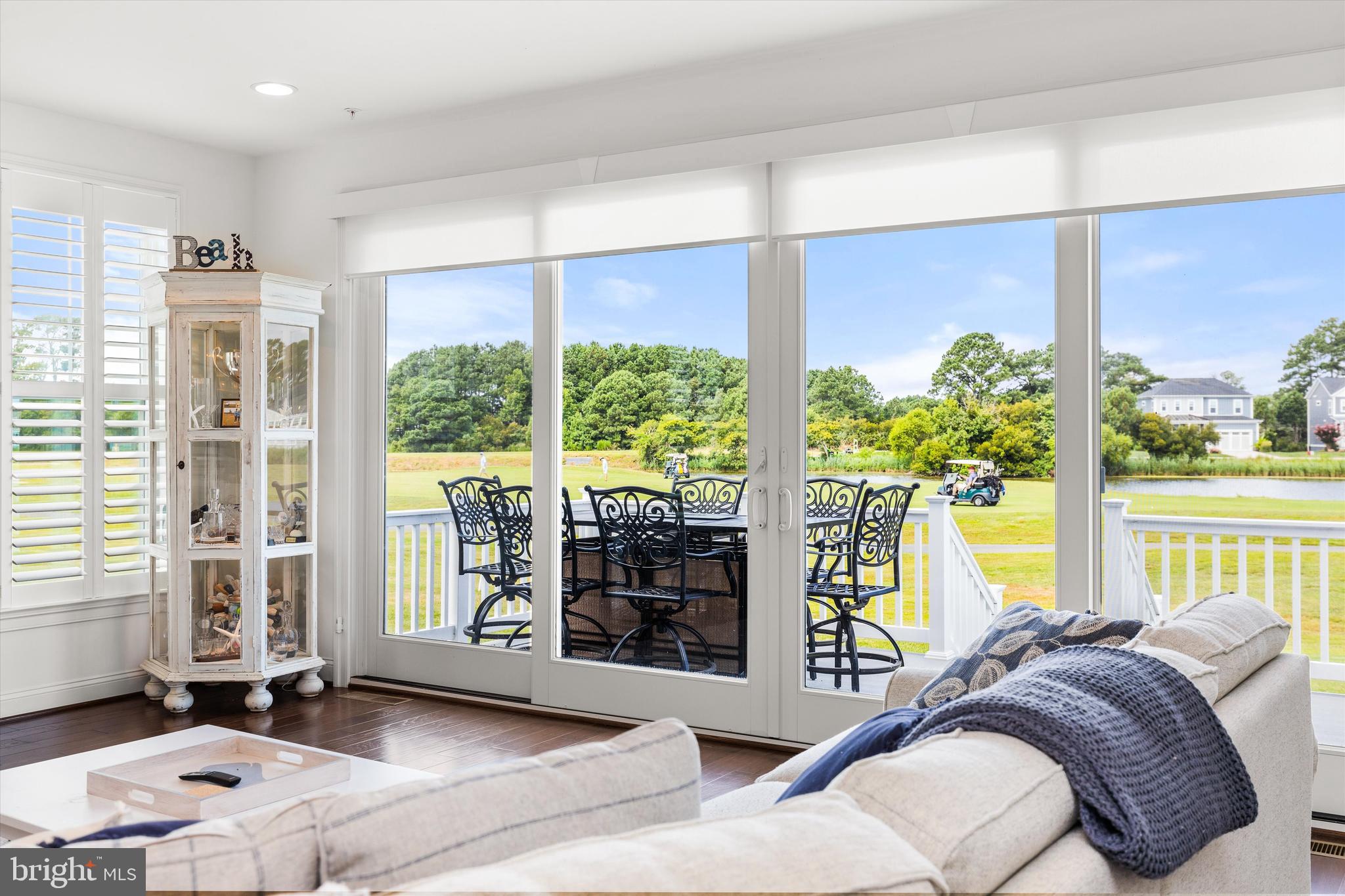 10119 Fast Colors Lane Berlin, MD 21811 - Photo 15 of 43 a bedroom with furniture and large windows