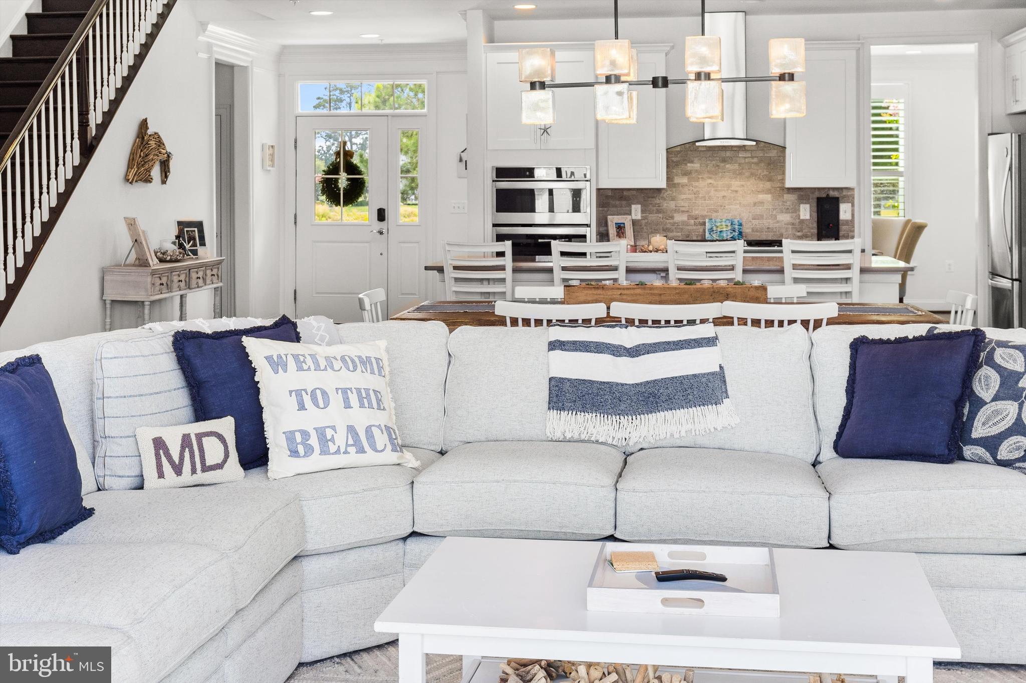 10119 Fast Colors Lane Berlin, MD 21811 - Photo 16 of 43 a living room with furniture and a fireplace