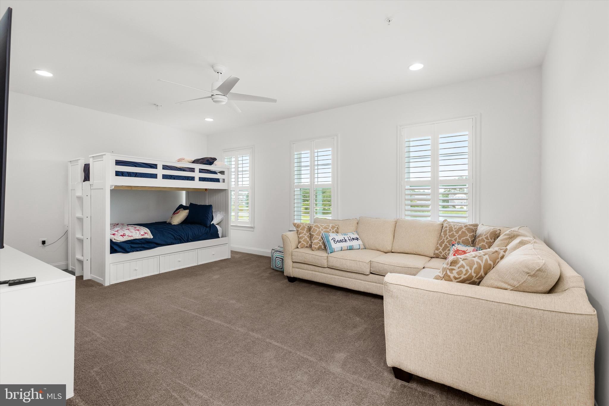 10119 Fast Colors Lane Berlin, MD 21811 - Photo 32 of 43 a living room with furniture and a fireplace