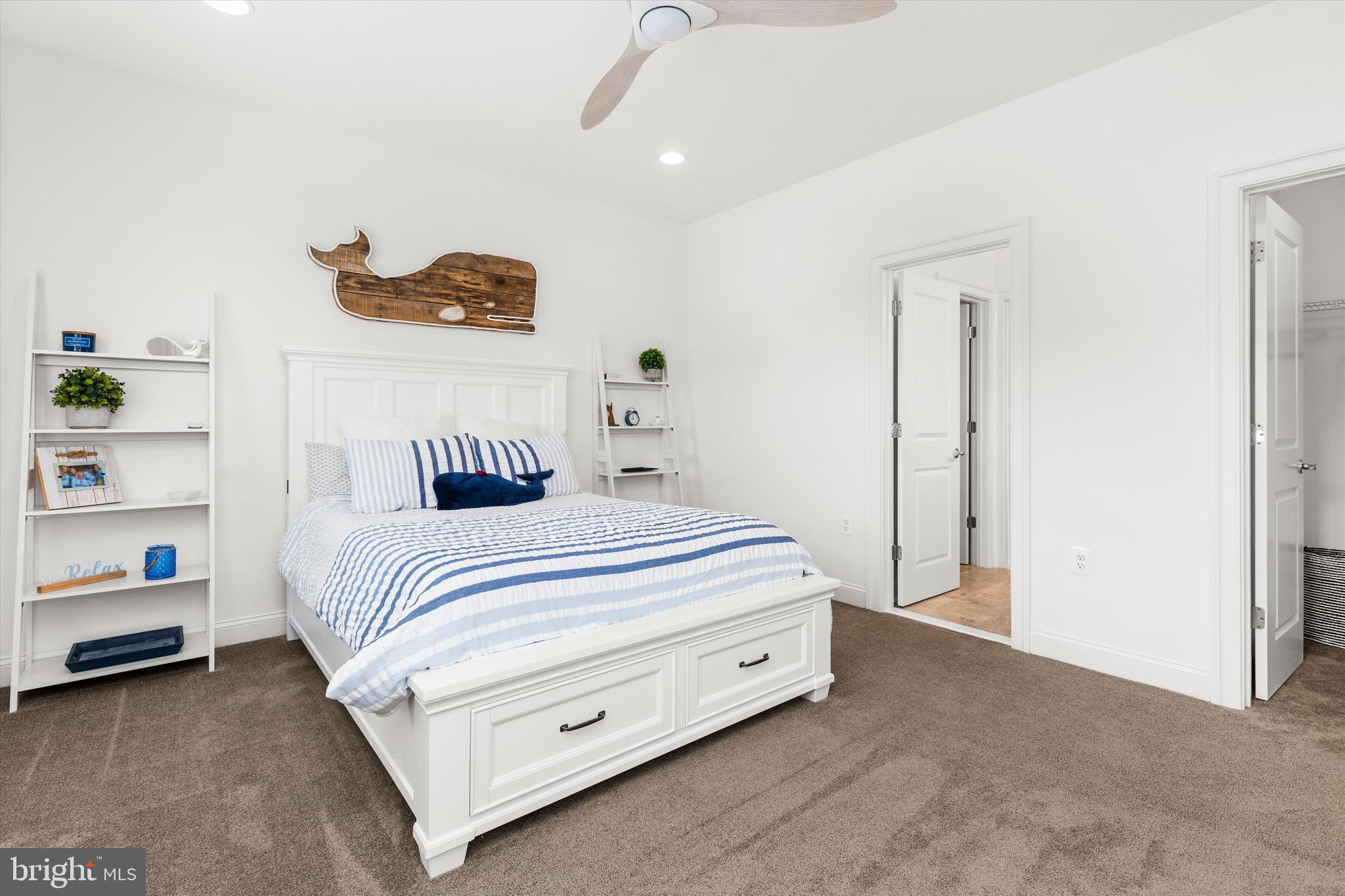 10119 Fast Colors Lane Berlin, MD 21811 - Photo 36 of 43 a bedroom with a bed and a window