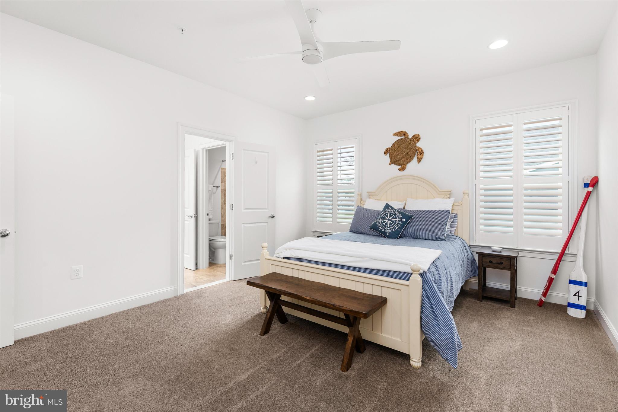 10119 Fast Colors Lane Berlin, MD 21811 - Photo 40 of 43 a bedroom with a bed and a window