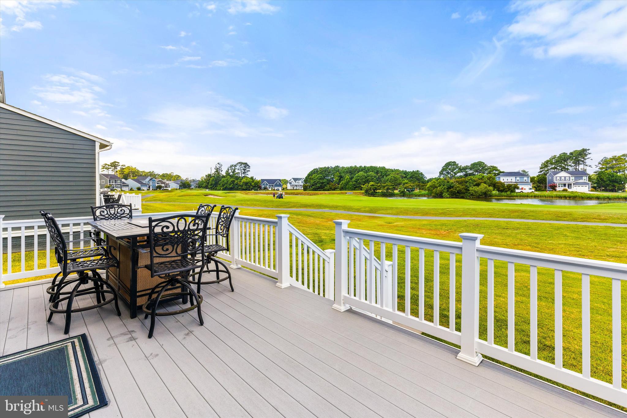10119 Fast Colors Lane Berlin, MD 21811 - Photo 42 of 43 a view of a chairs and table on the terrace