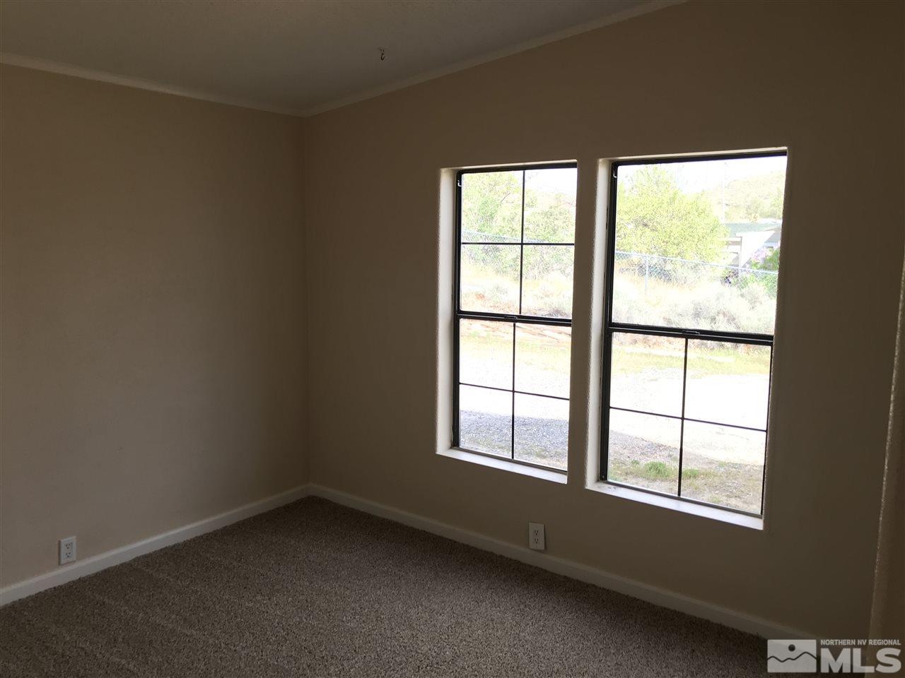 1890 Collins Circle Reno, NV 89506 - Photo 13 of 21 an empty room with a window