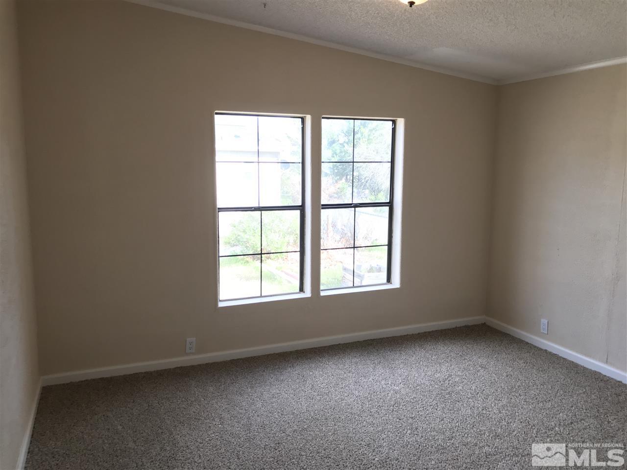 1890 Collins Circle Reno, NV 89506 - Photo 17 of 21 an empty room with a window