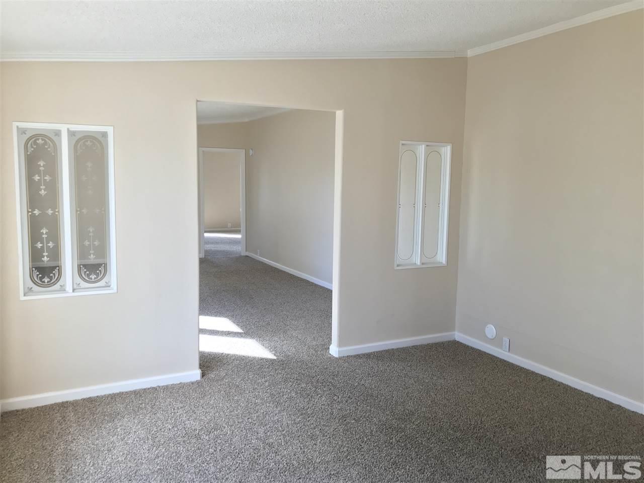 1890 Collins Circle Reno, NV 89506 - Photo 4 of 21 an empty room with windows
