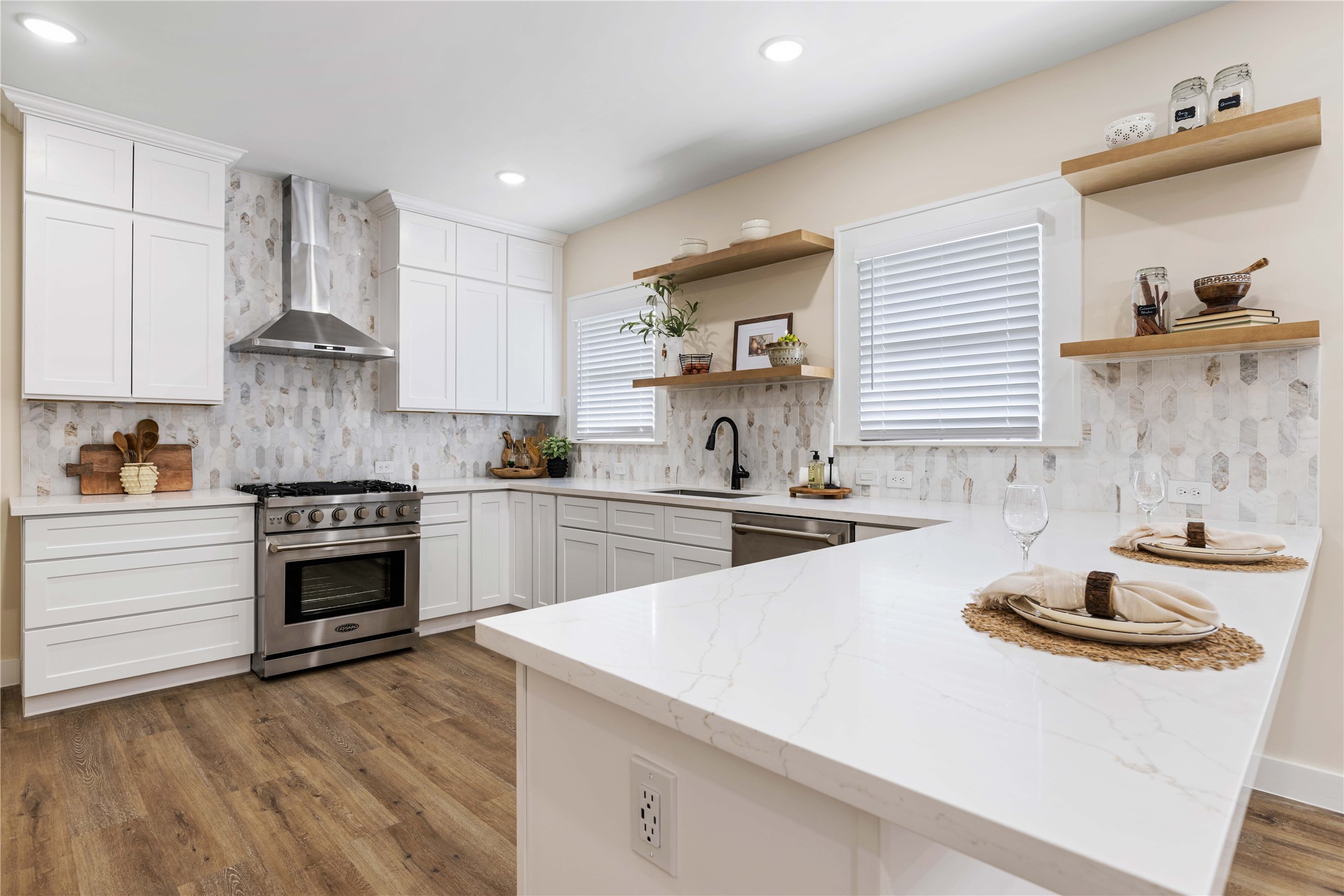 908 Key Street Houston, TX 77009 - Photo 7 of 29 SS appliances, quartz countertops, marble tile backsplash