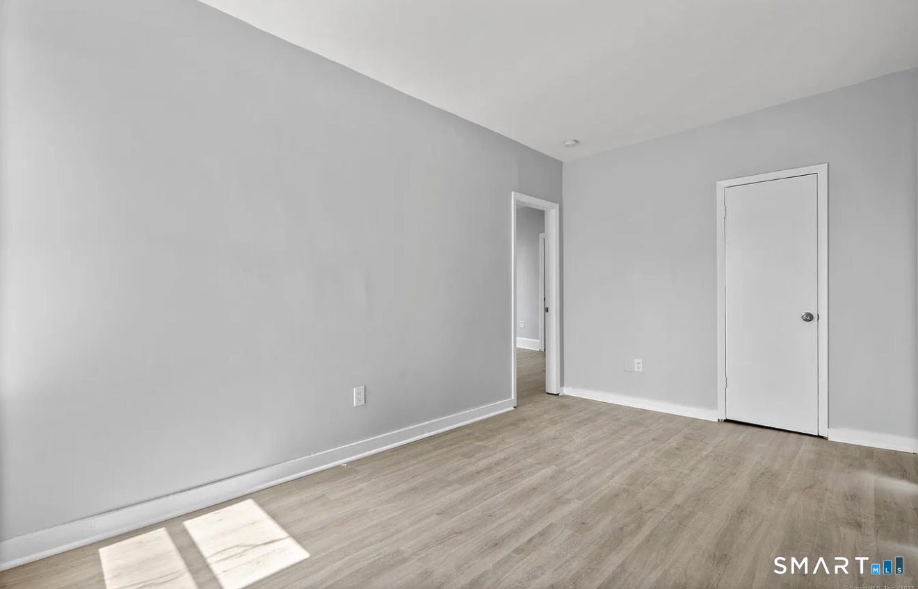 25 Whittier Street, Unit 3 Bridgeport, CT 06605 - Photo 7 of 7 a view of an empty room and window