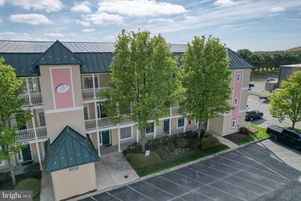 an aerial view of a house with a garden