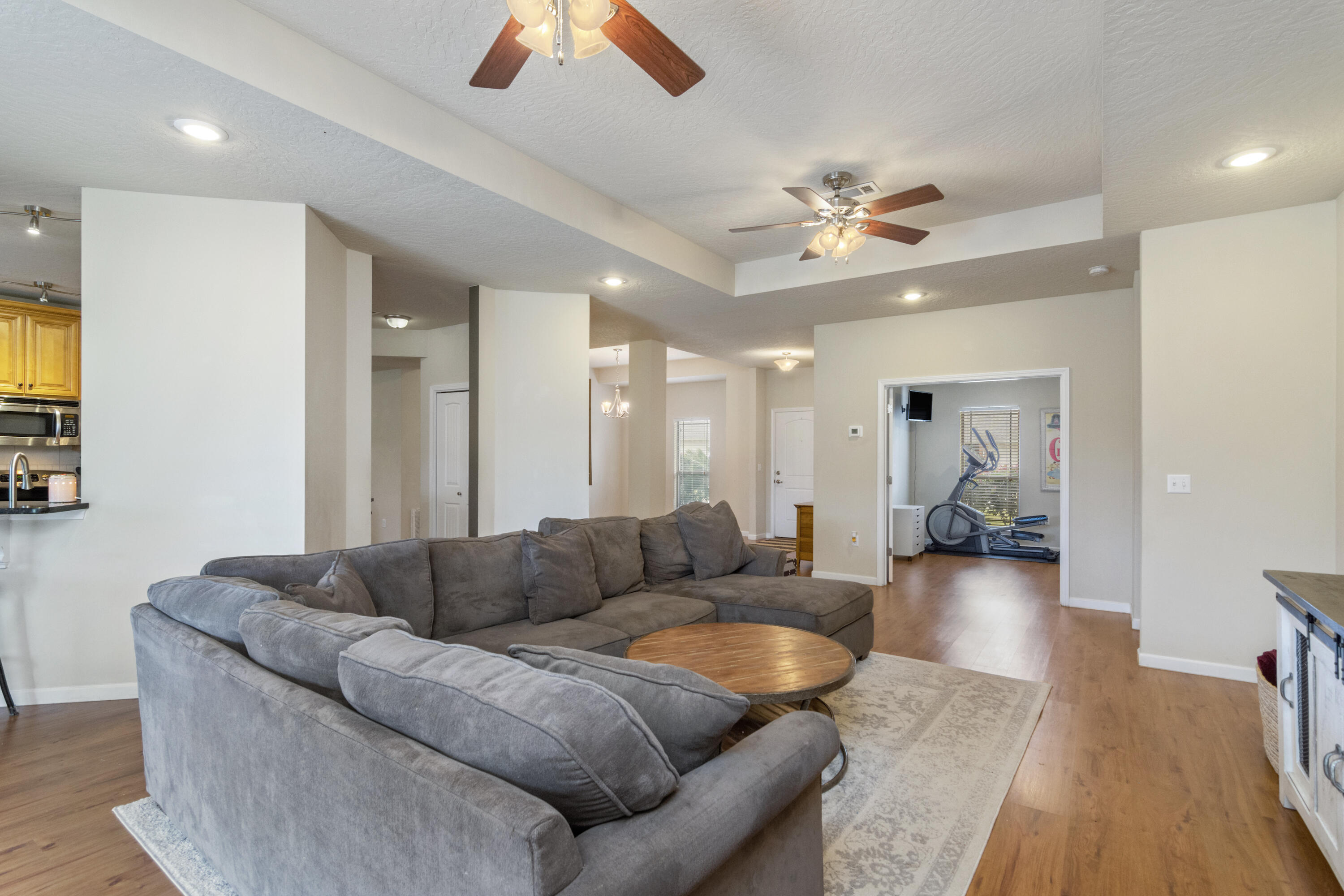 5265 Moore Loop Crestview, FL 32536 - Photo 13 of 43 a living room with furniture and a chandelier