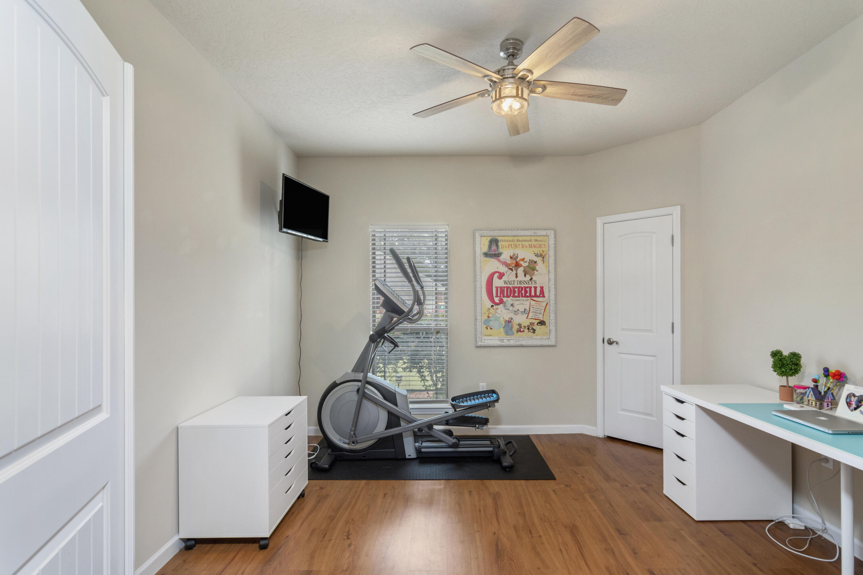 5265 Moore Loop Crestview, FL 32536 - Photo 16 of 43 a view of a workspace with furniture and wooden floor