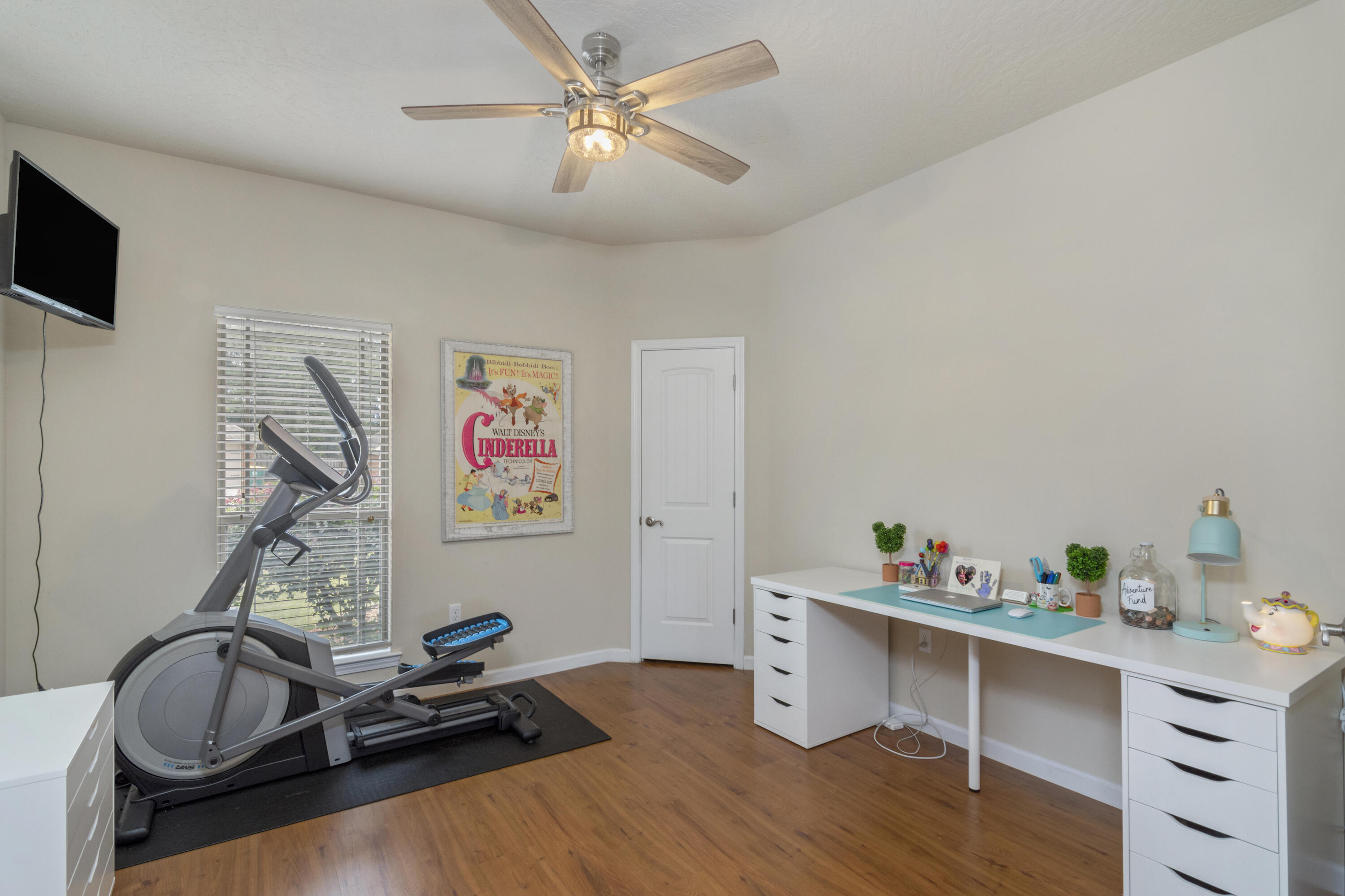 5265 Moore Loop Crestview, FL 32536 - Photo 17 of 43 a room with furniture and flat screen tv