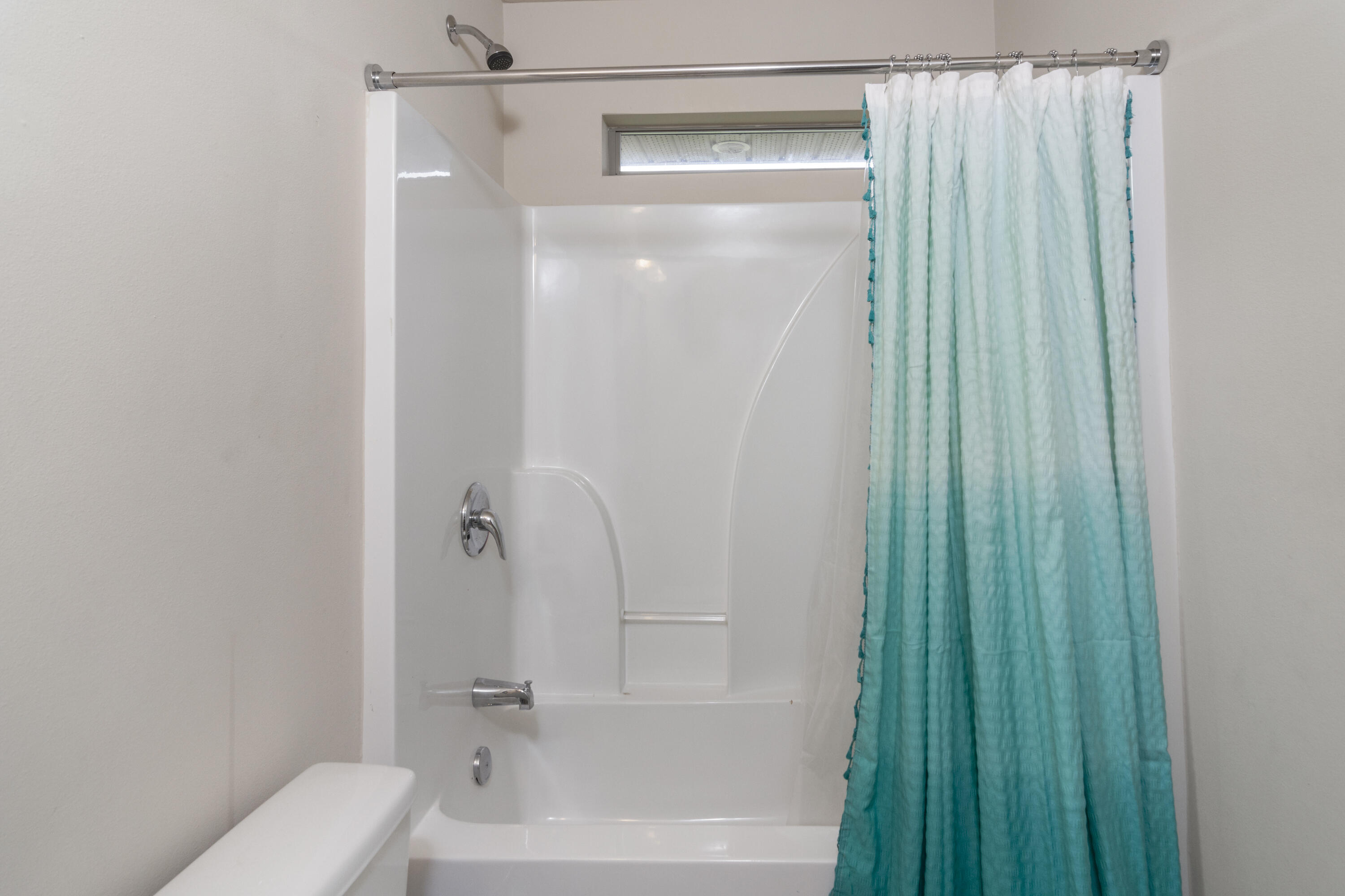 5265 Moore Loop Crestview, FL 32536 - Photo 21 of 43 a bathroom with a shower and a toilet