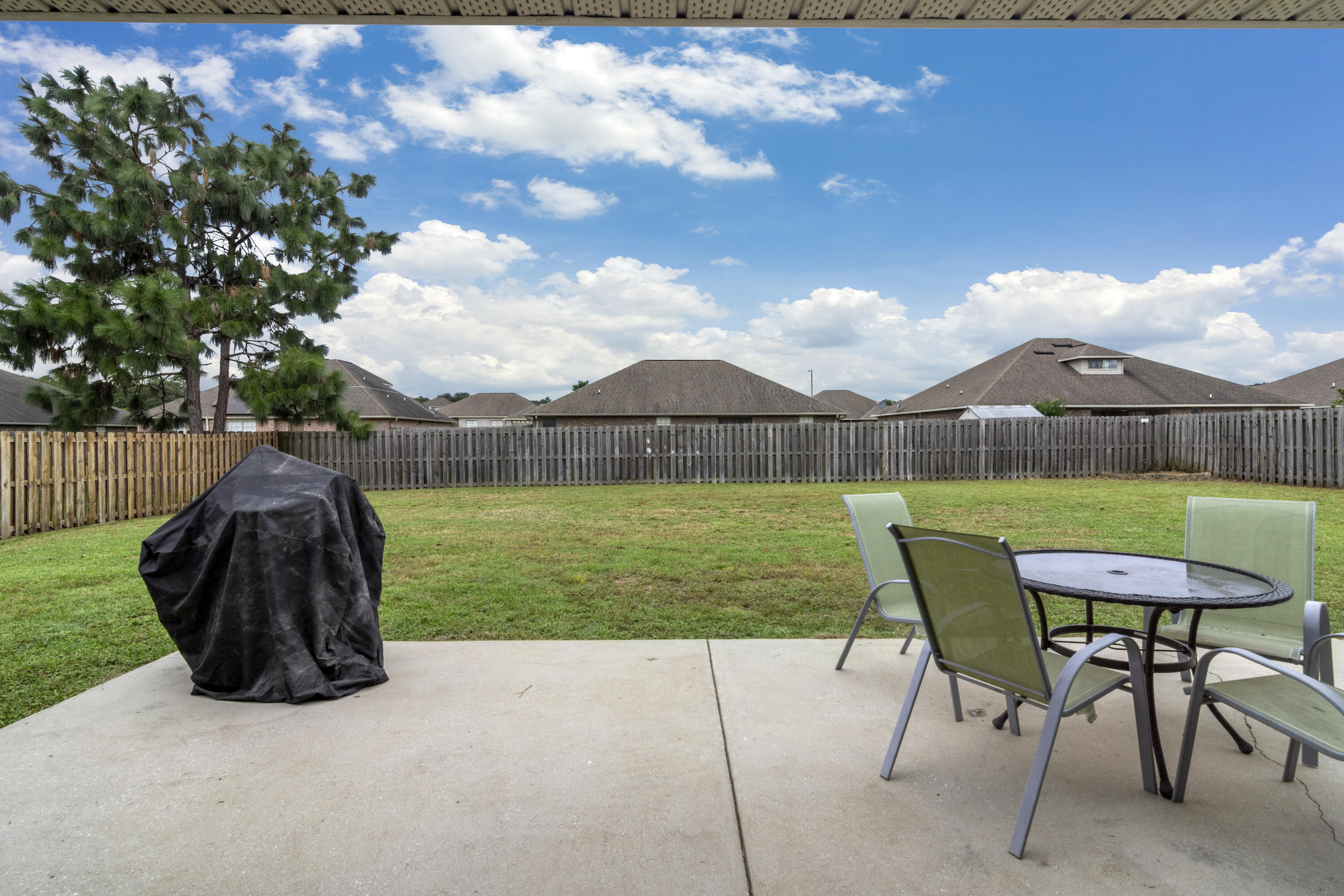 5265 Moore Loop Crestview, FL 32536 - Photo 37 of 43 a view of a garden with a slide
