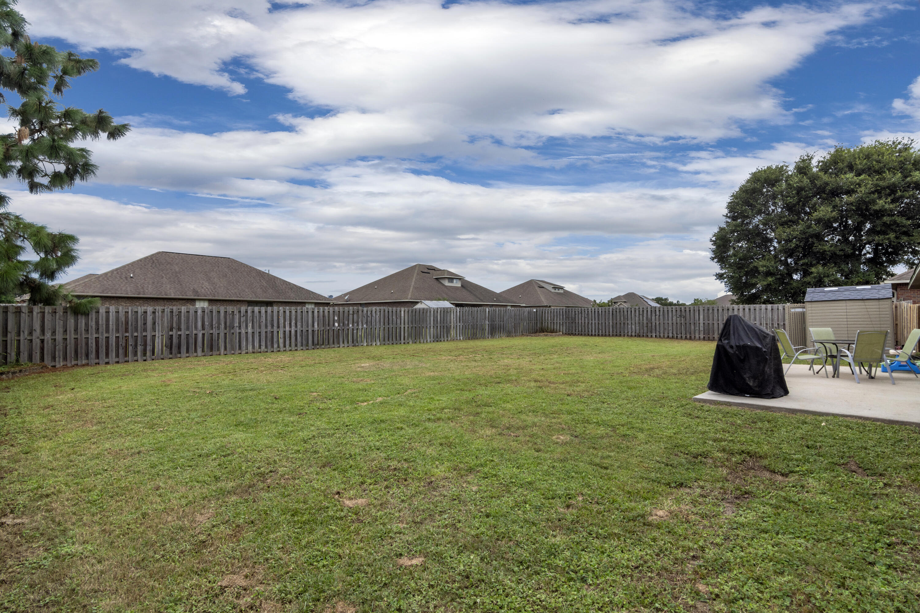 5265 Moore Loop Crestview, FL 32536 - Photo 39 of 43 a view of yard with outdoor seating