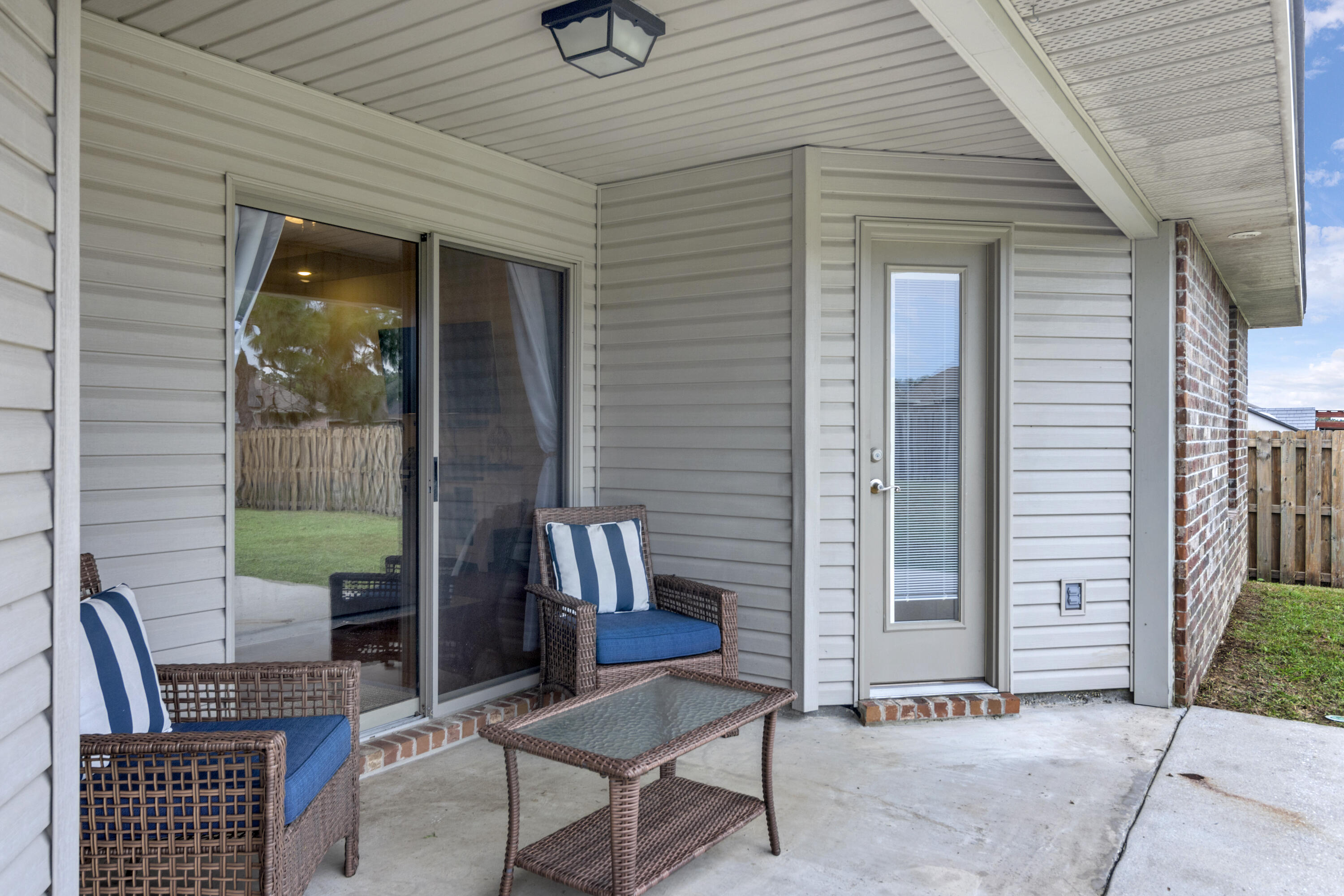 5265 Moore Loop Crestview, FL 32536 - Photo 43 of 43 a view of a patio with couple of chairs