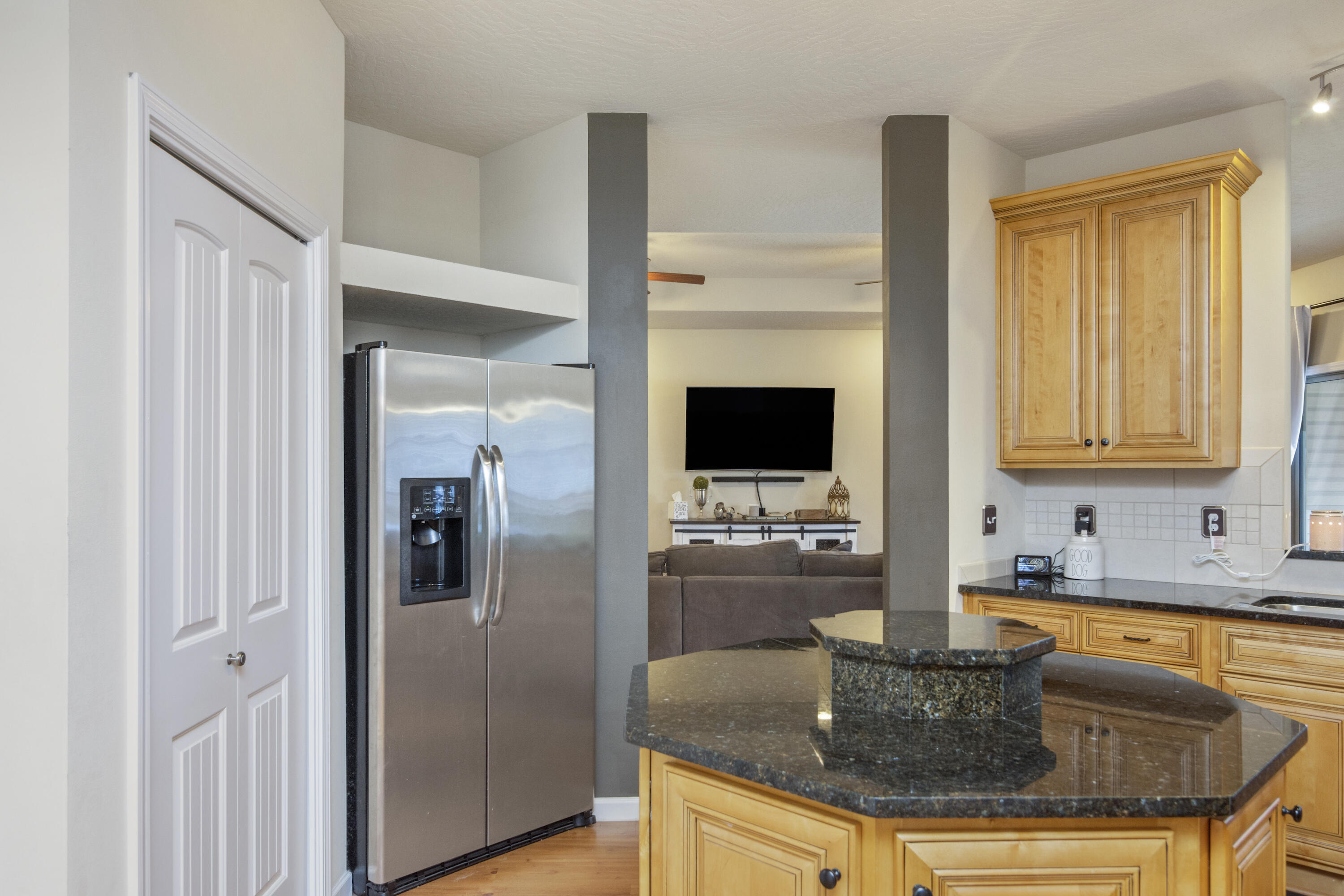 5265 Moore Loop Crestview, FL 32536 - Photo 7 of 43 a kitchen with granite countertop a sink and cabinets
