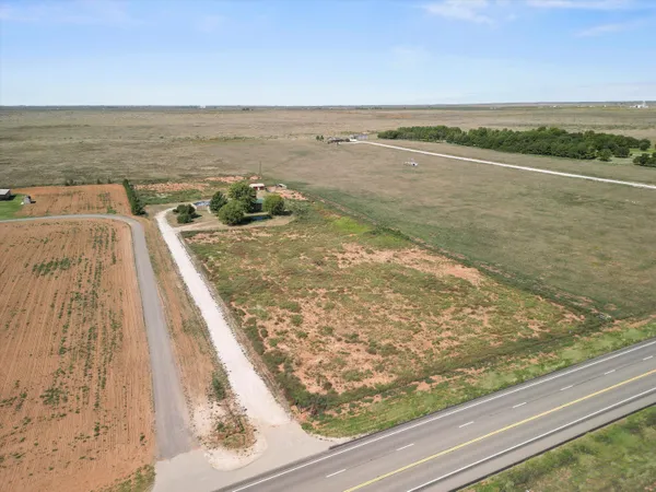 a view of a lake from a balcony