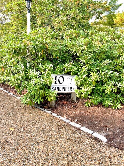 10 Sandpiper Road Harwich, MA 02645 - Photo 3 of 41 a view of a street with a trees