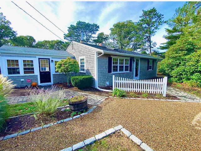10 Sandpiper Road Harwich, MA 02645 - Photo 5 of 41 front view of a house with a garden
