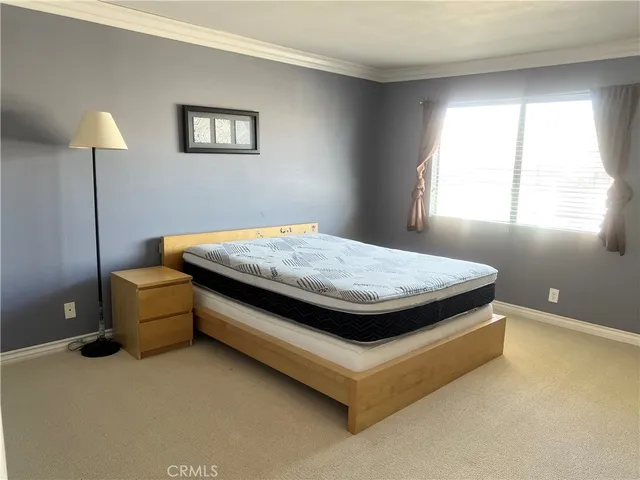 a view of an empty room and a window