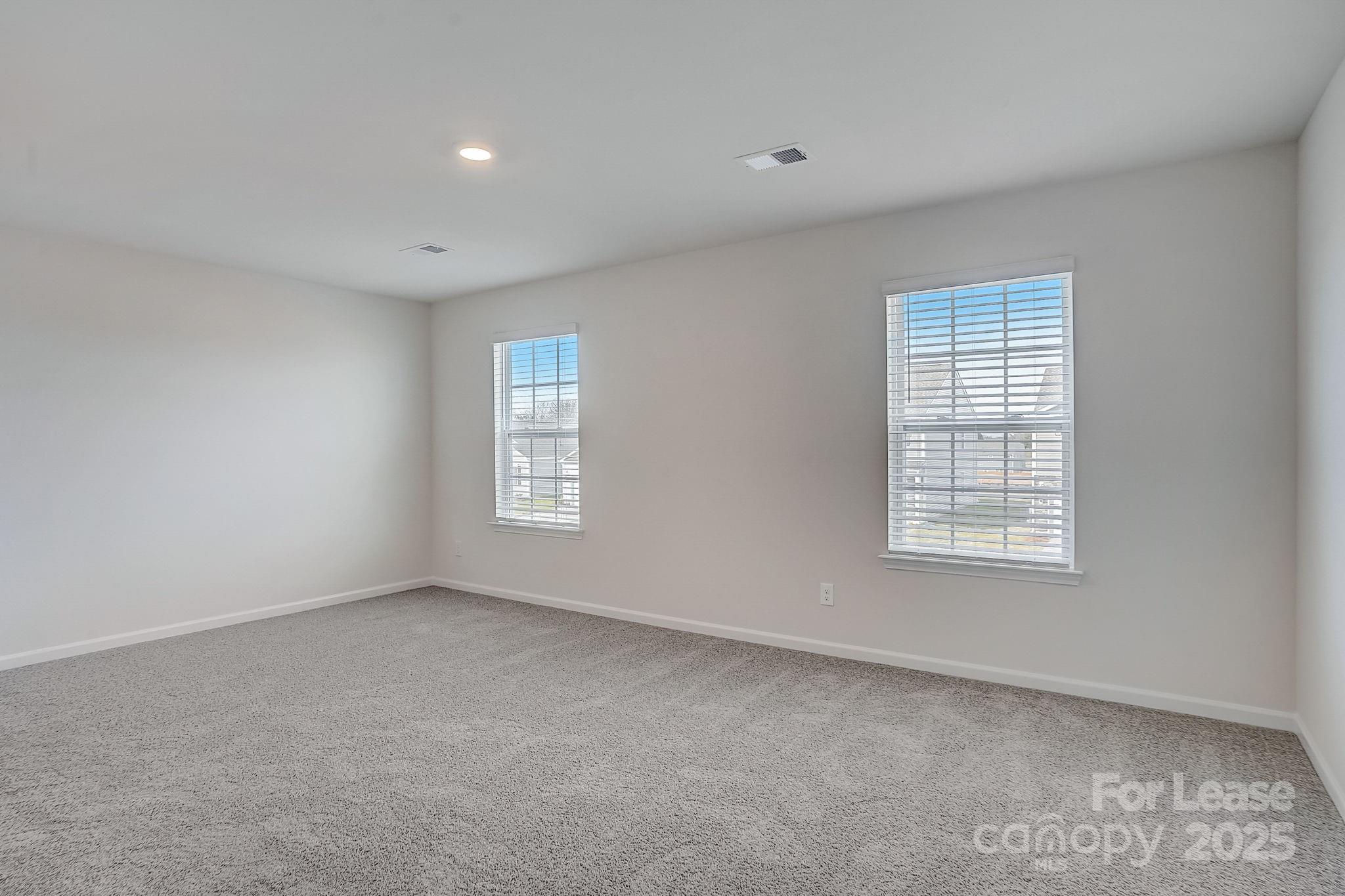 142 Old Home Road Statesville, NC 28677 - Photo 14 of 23 an empty room with windows