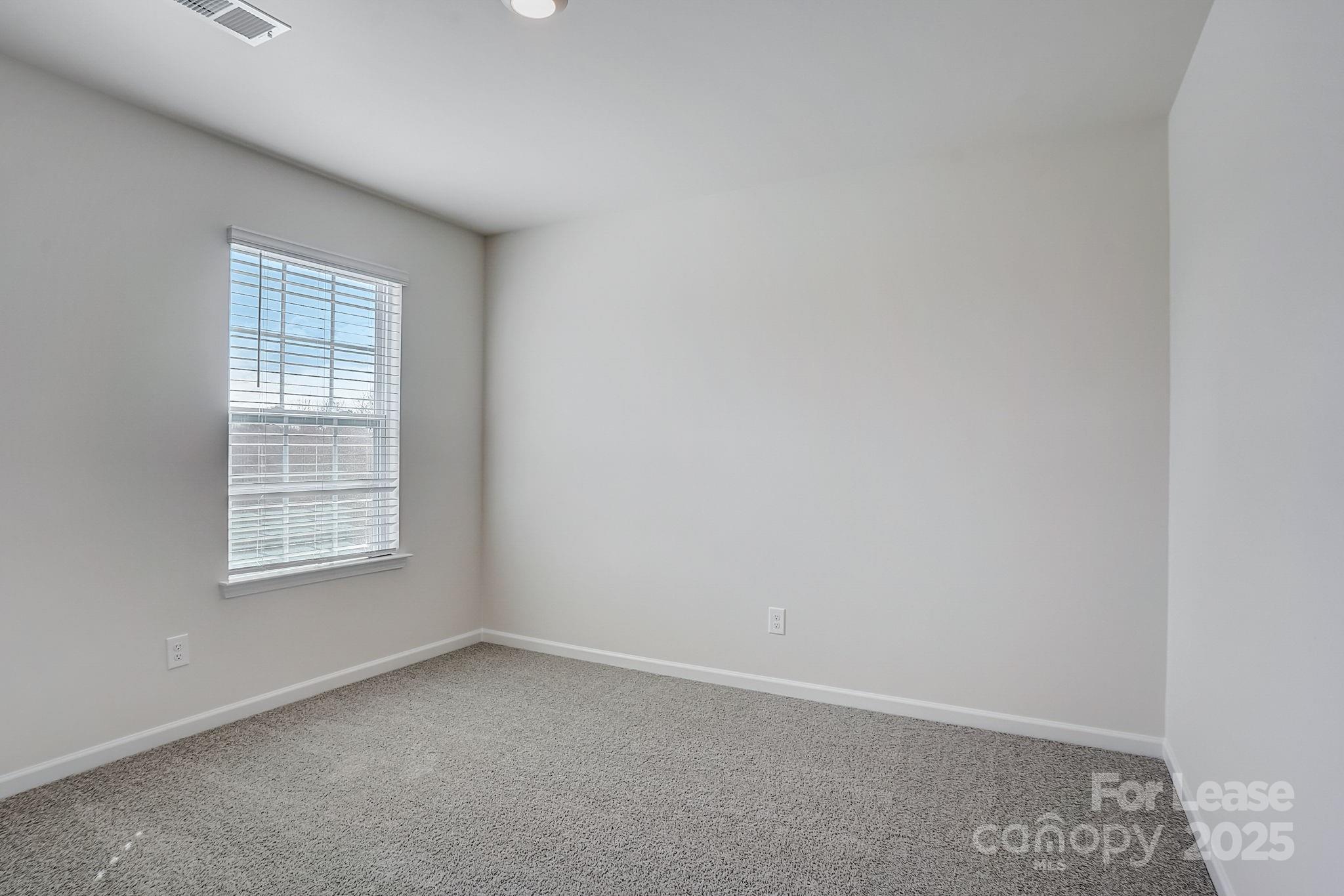 142 Old Home Road Statesville, NC 28677 - Photo 21 of 23 an empty room with a window