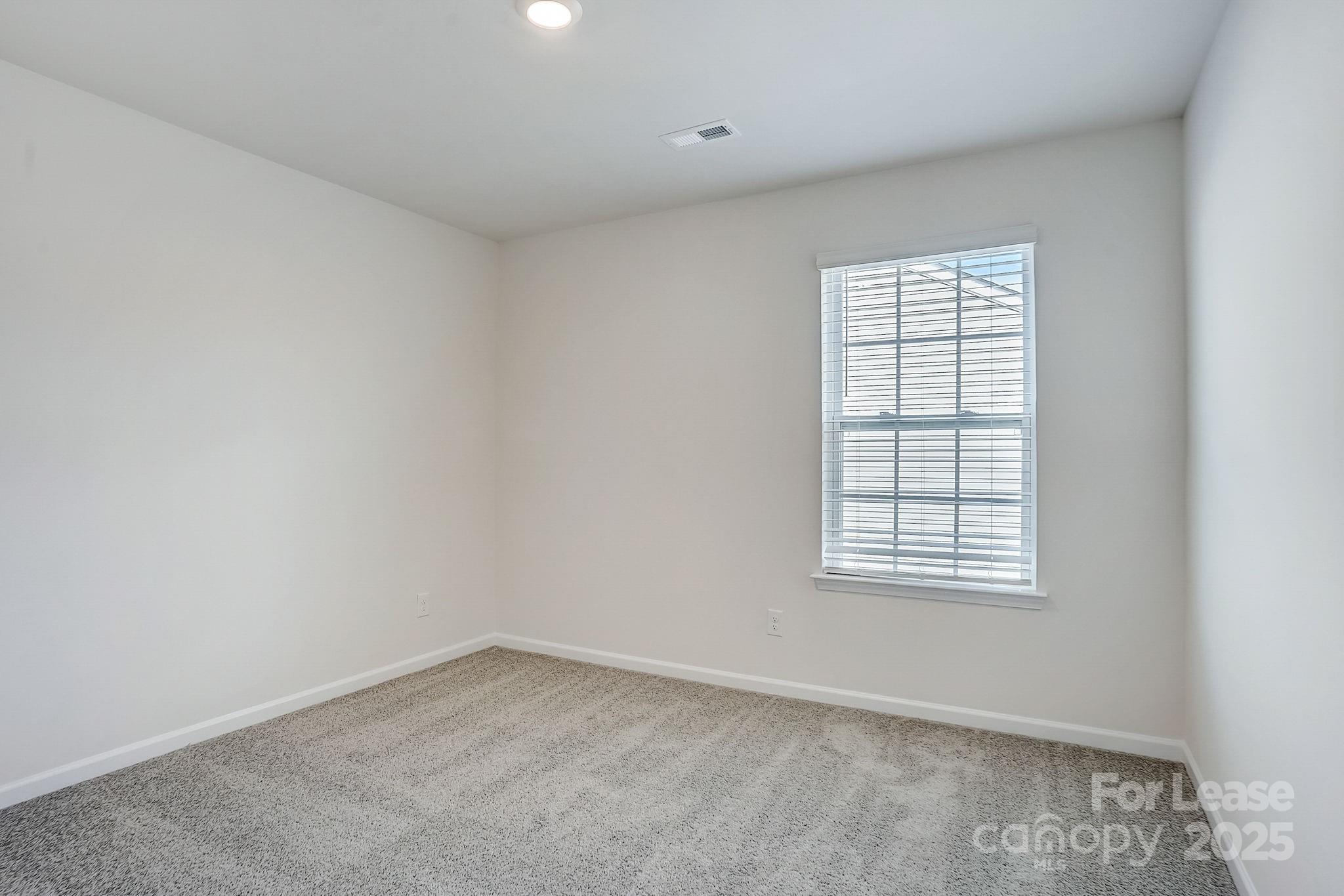 142 Old Home Road Statesville, NC 28677 - Photo 22 of 23 an empty room with windows