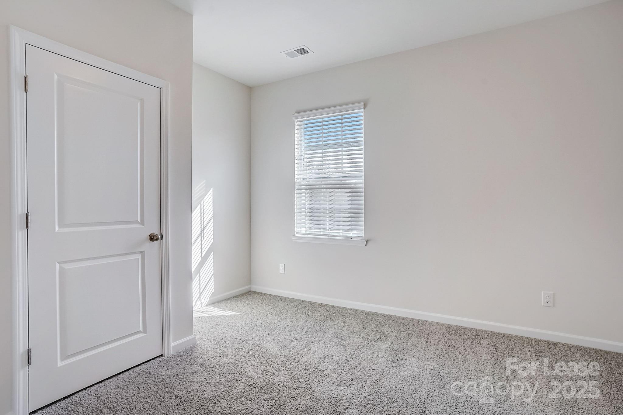 142 Old Home Road Statesville, NC 28677 - Photo 9 of 23 a view of an empty room with a window